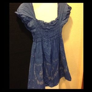 Ocean blue peasant style dress.