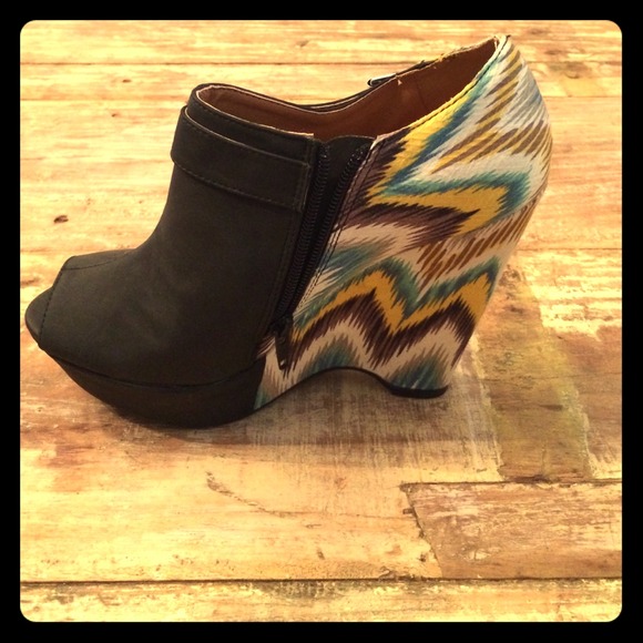 Never worn adorable black wedge booties