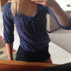 Blue quarter sleeve top w/ buttons and bow. Target