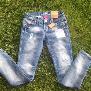 Distressed Denim Skinny Jeans