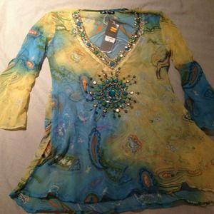 Sheer whimsical beach coverup.