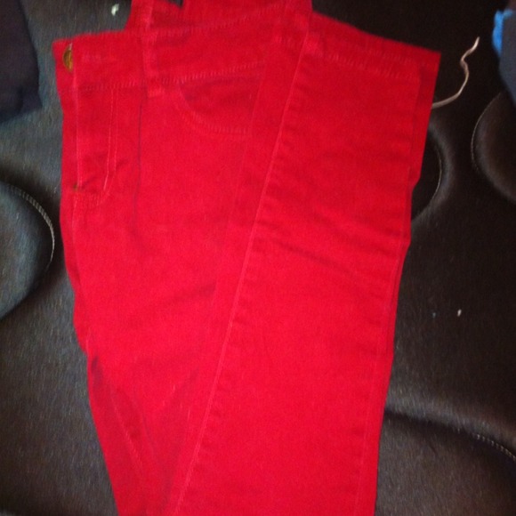 Red skinny jeans .