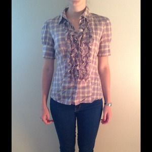 Moda international ruffle front button up top