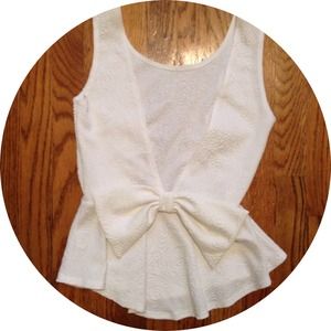 White paisley peplum top with bow in back