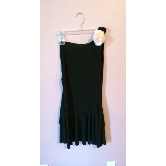Black off-the-shoulder cocktail dress.