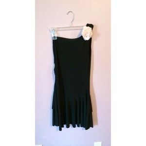 Black off-the-shoulder cocktail dress.