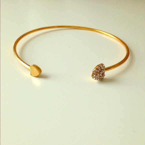 Gold heart bracelet.