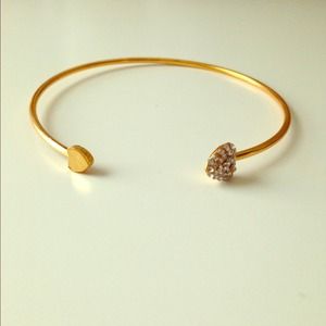 Gold heart bracelet.