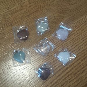 A Set of 7 Different Heart Pendants