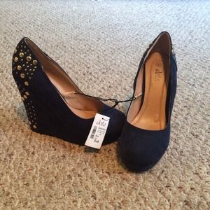 Blue wedges with gold detailing