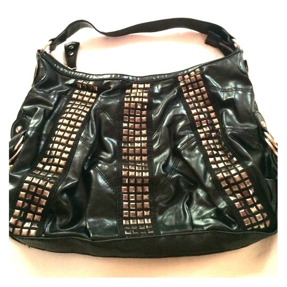 Carlos Santana Black Bag