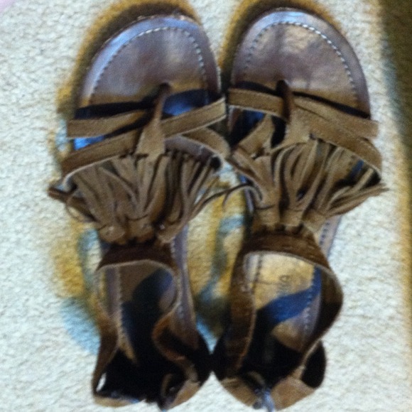 Minnetonka sandals with fridges!!