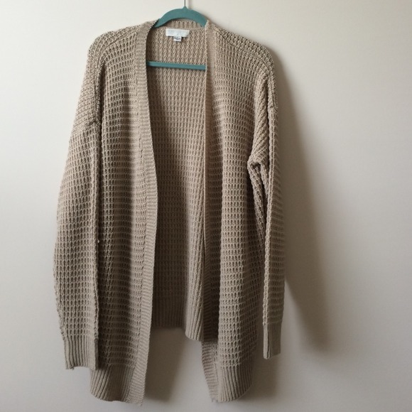 Knitted oatmeal color cardigan