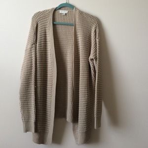Knitted oatmeal color cardigan