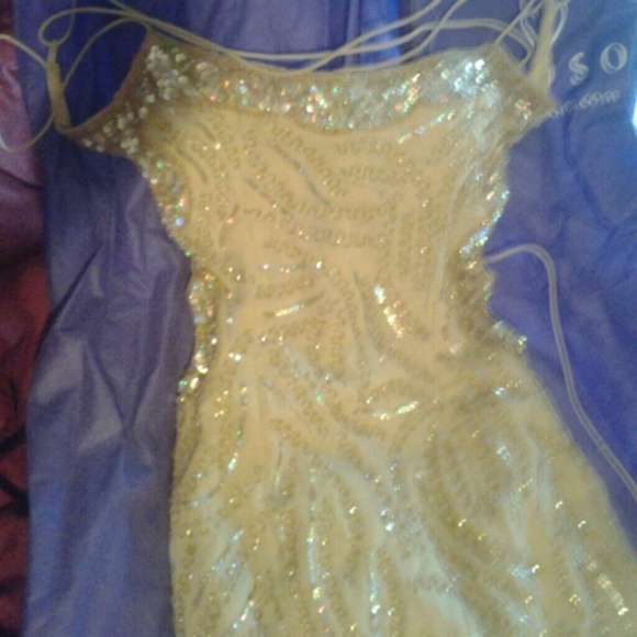 A beautiful gold dress only worn once