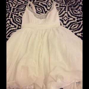 Love white little embellished dress.