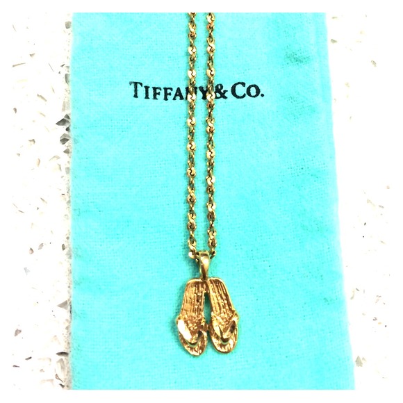 Gold necklace with sandal charm! Price reduced!