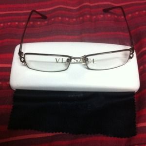 Authentic Versace glasses reading book