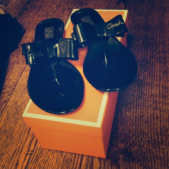 Coach brand new black flip flops with bow detail
