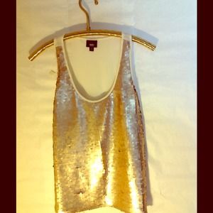 Large, gold, and glamorous made with coined discs