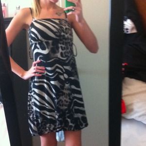 Leopard dress with belt loops.