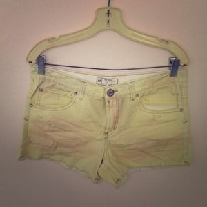 Free People Yellow Distressed Cutoffs