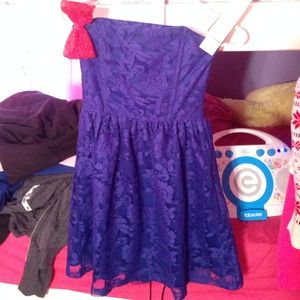 Blue/purple strapless dress.