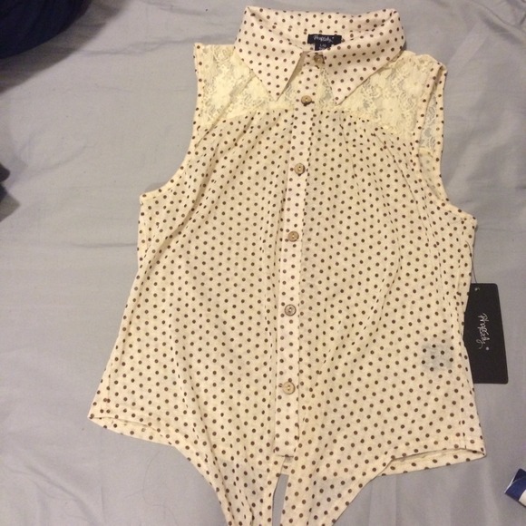 Cream sleeveless button up with brown polka dots - Picture 1 of 1