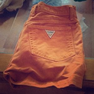 Orange high waisted Guess shorts