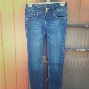 Papaya bejewelled skinny jeans.