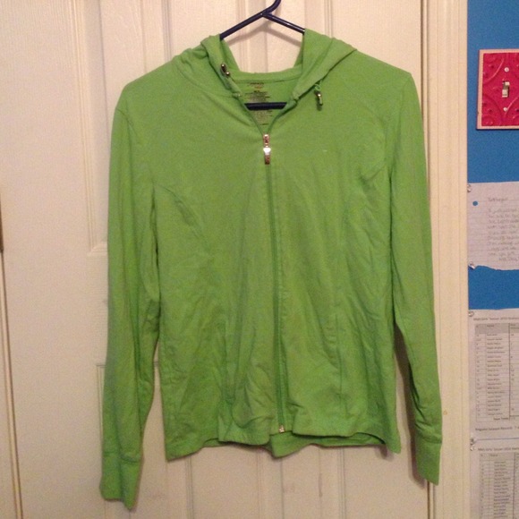 a green, thin, athletic jacket.