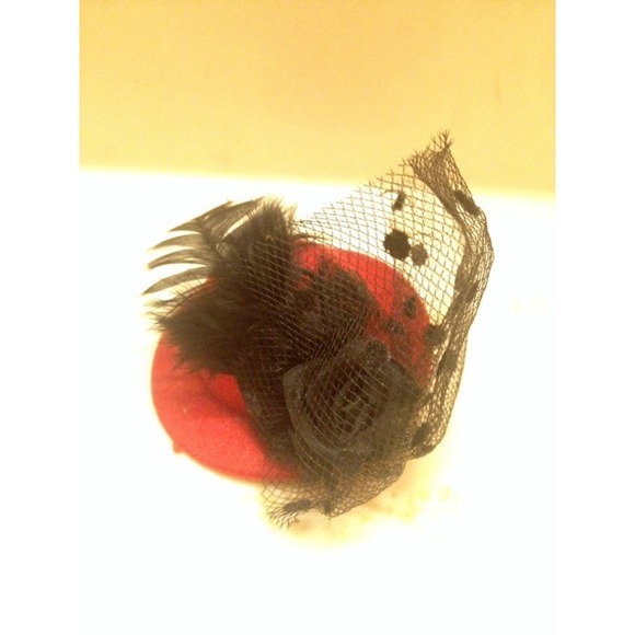 Little red hat hair clip accessory.