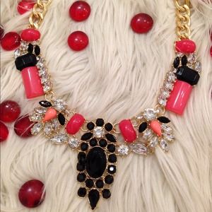 Pink and black stone necklace. Available in green