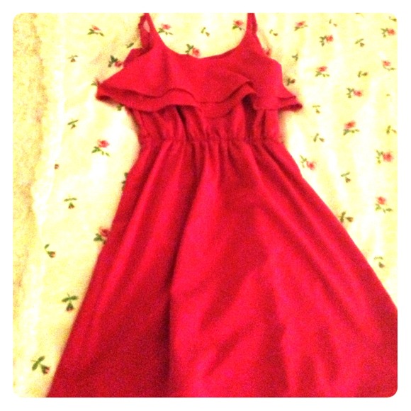 A pretty ruffled- at the top pink dress! So cute!