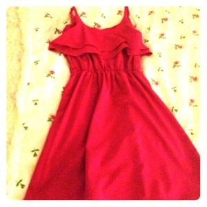 A pretty ruffled- at the top pink dress! So cute!