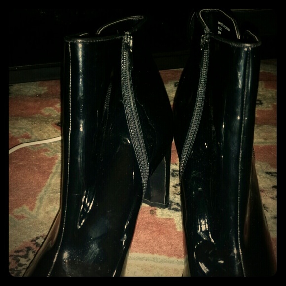 Indeed boots. Patent leather like