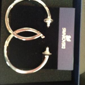 Swarovski earrings.