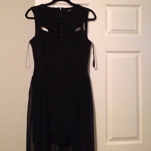 Little black dress with caged from and back.