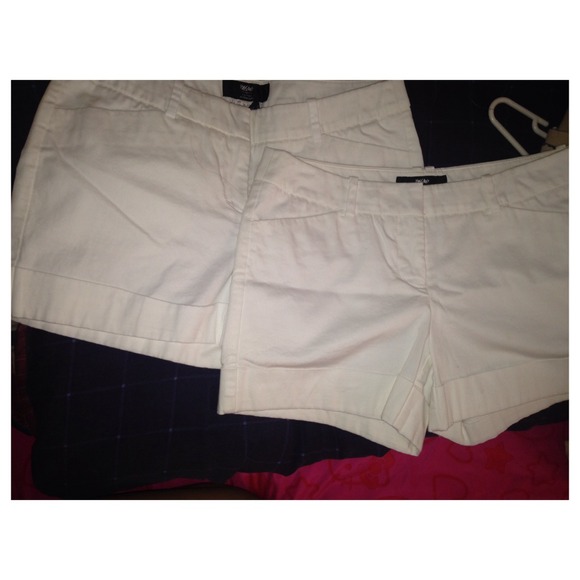 2 pairs of white shorts