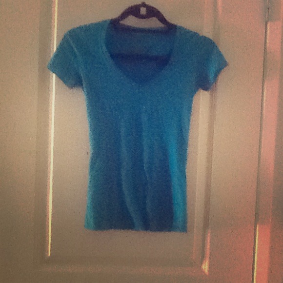 Bright blue V-neck.