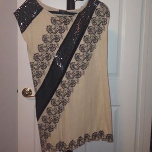 Express. Fancy top with design and sequin