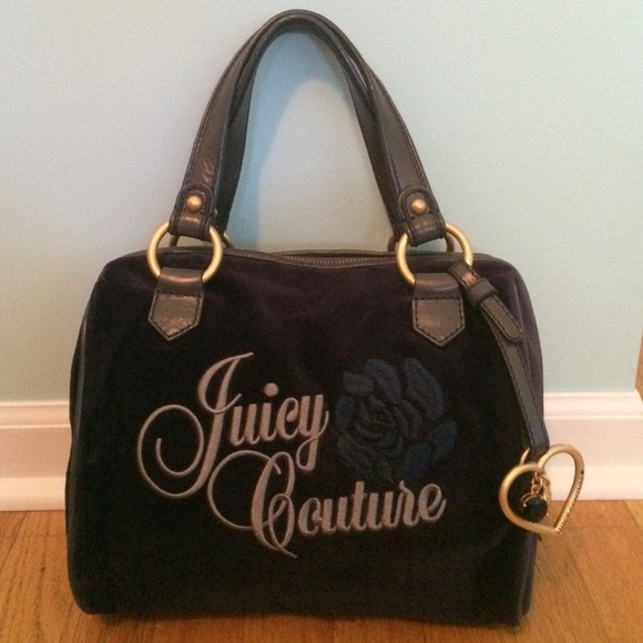 Navy blue Juicy couture hand bag. Practically new