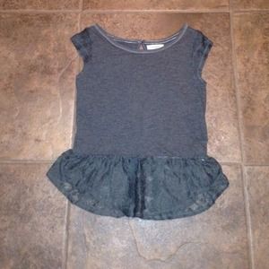 A fun shirt to dress up in and throw on a necklace