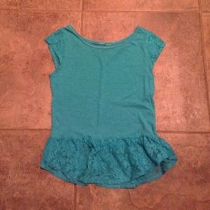A teal shirt very fun to wear!!!