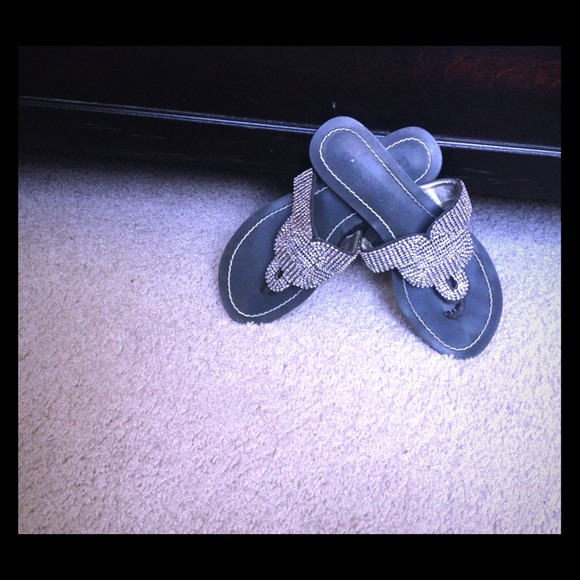 Black bejeweled thong sandal : by Collin Stuart