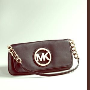 Gently used Michael Kors Fulton Flap leather bag