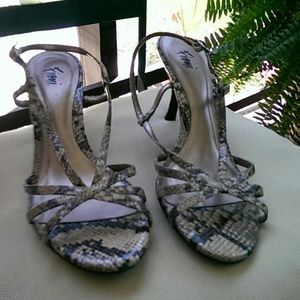 Very sexy Fioni faux snakeskin sling back sandals!