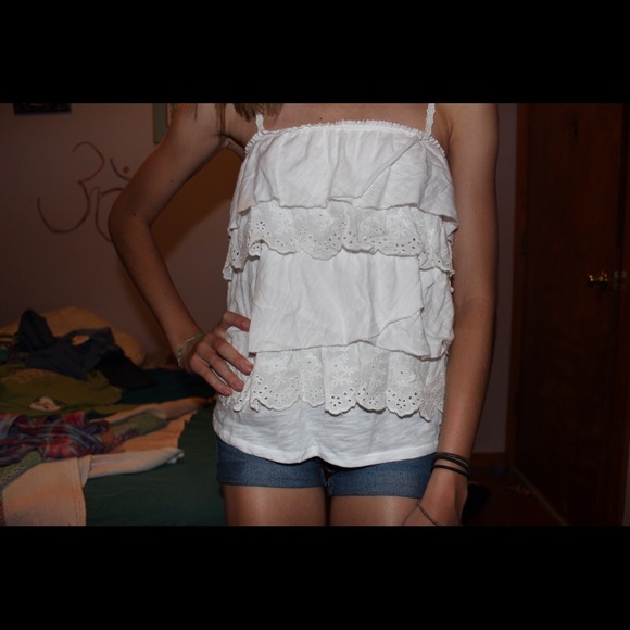 white ruffled top