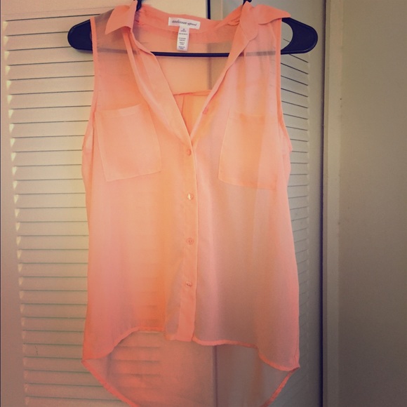 light orange button up sleeveless shirt