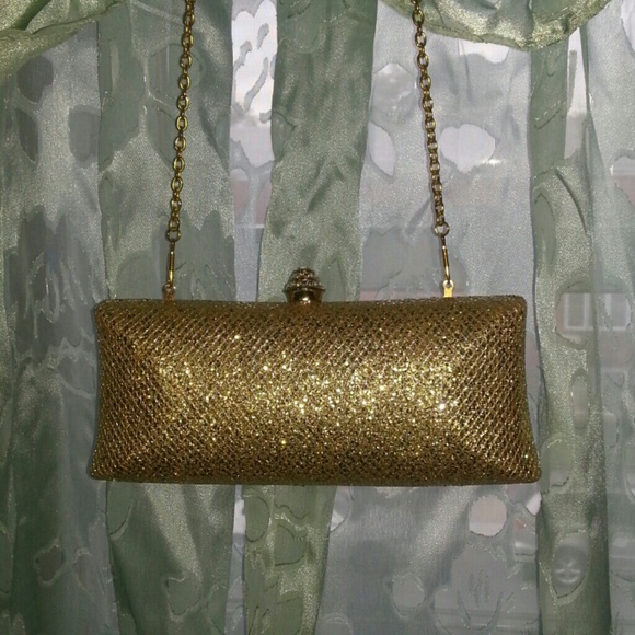 Gold clutch with Retractable shoulder chain